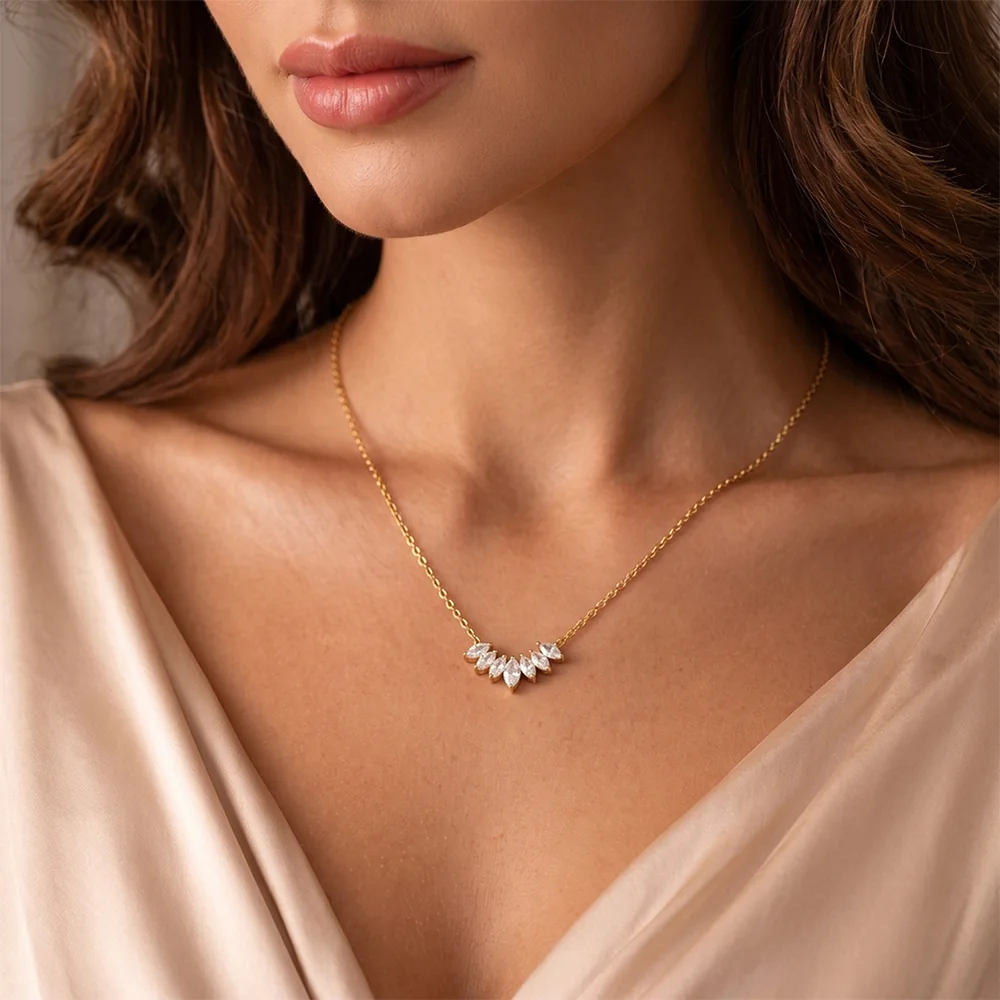 Gold-tone stainless steel necklace shown at wearable scale